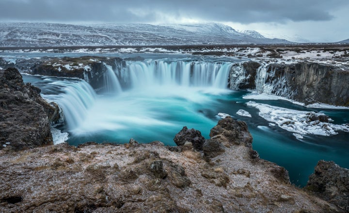 Rain and rivers carry carbonic acid out to sea.