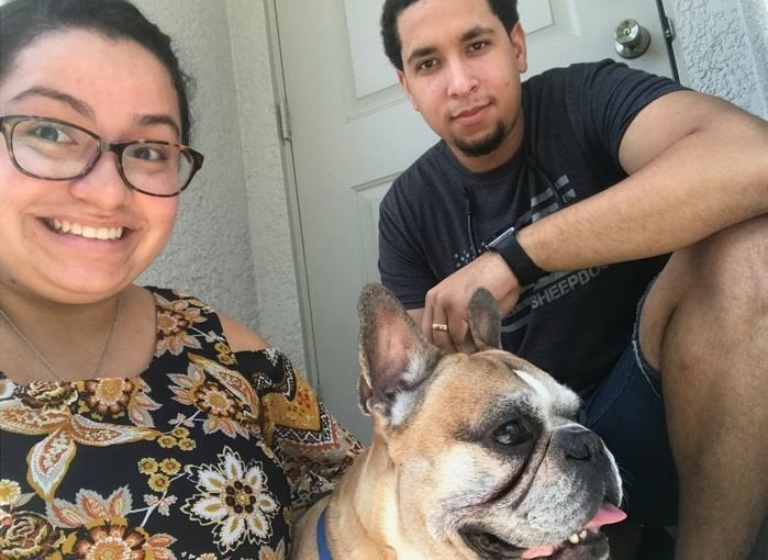 The good boy and his humans, María and David.