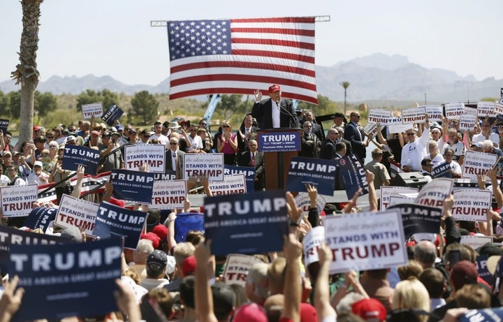 Then-Republican U.S. presidential candidate Donald Trump speaks at a campaign rally in Fountain Hills, Ariz., March 19, 2016. 