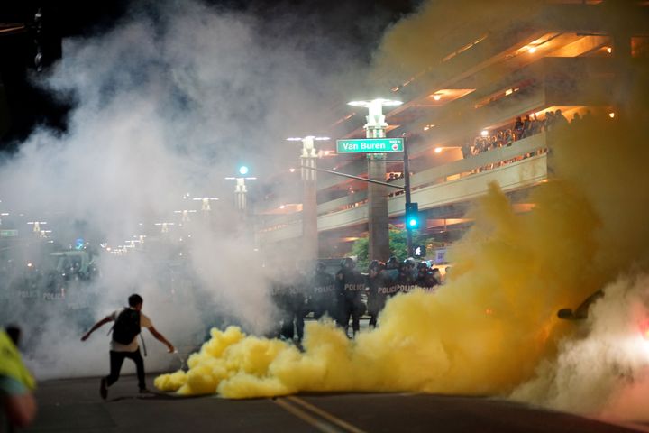 Tear gas is lobbed at demonstrators outside Trump's rally