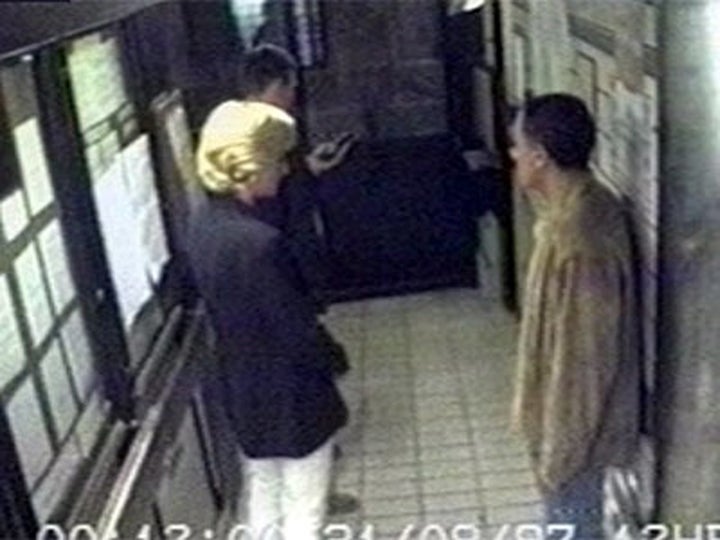 Diana and Fayed in the lobby of the hotel at around 00.12 as they prepare to leave 