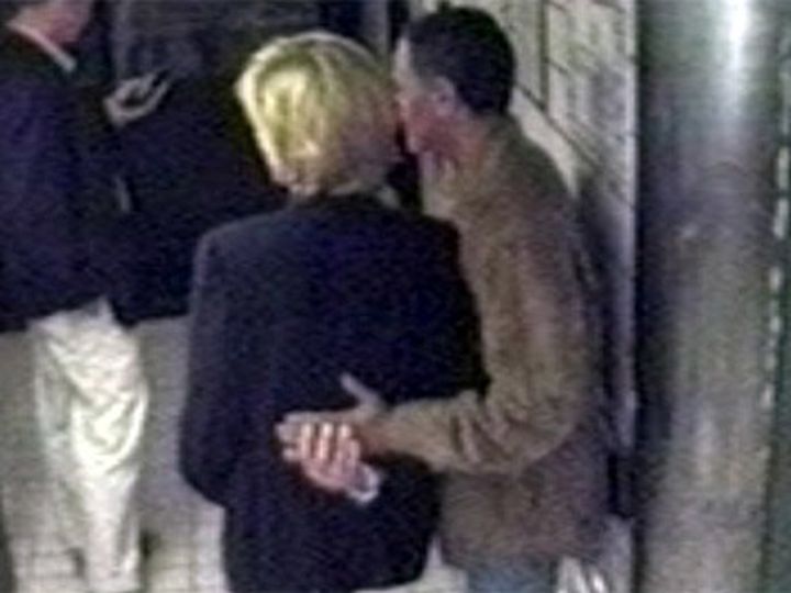 The couple were seen entwining their hands as Fayed put his arm around the princess 