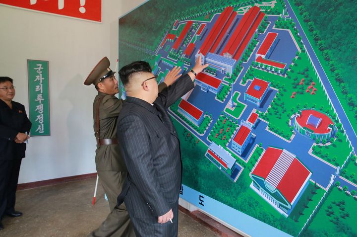 North Korean leader Kim Jong-Un gives field guidance during a visit to the Chemical Material Institute of the Academy of Defense Science. 