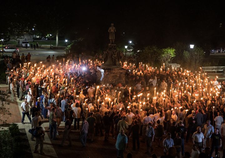 Several hundred white supremacists carrying torches parade through the University of Virginia campus on Aug. 11.