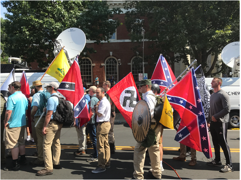 <em>“Racism might not look like chains anymore, but it can still feel like a prison cell,” the author writes. Photo credit:</