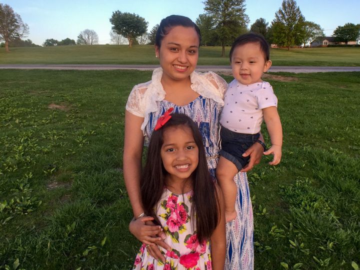 Riccy Enriquez Perdomo, a 22-year-old with residency protection under the Deferred Action for Childhood Arrivals program, and her two children