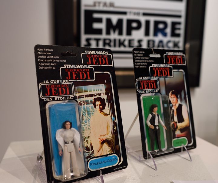 A Star Wars Princess Leia and Han Solo action figures are among the items of Star Wars collectibles: Return of the NIGO displayed during a press preview at Sotheby's December 2, 2015 in New York. Fans of Star Wars films who are awaiting the release of Star Wars: The Force Awakens next month can bid for collectibles in an online auction. The sale, 'Return of the Nigo', offers more than 600 original action figures, replica Darth Vader helmets, autographed light sabers and vintage film posters, amo