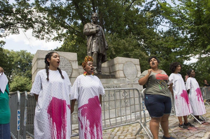 Protesters demand that the New York City Parks Department remove the statue of Dr. J. Marion Sims from its current location on Fifth Avenue and 103rd Street.