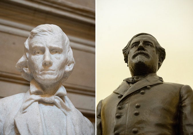 <p>Statues of Alexander Stephens, Vice-President of the Confederacy (L) and Confederate General Robert E. Lee (R), on display in the U.S. Capitol building.</p>