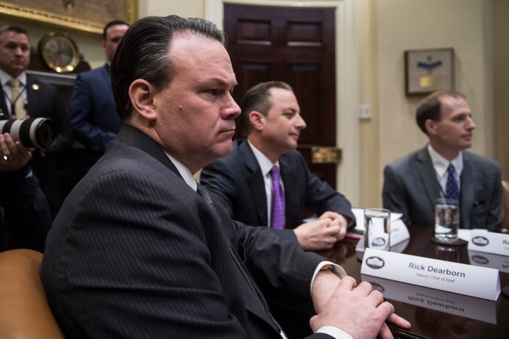 Deputy chief of staff Rick Dearborn, left, listens as President Trump speaks during a healthcare discussion with key House Committee Chairmen in the Roosevelt Room at the White House on Friday, March. 10, 2017.