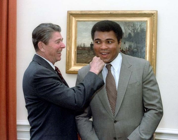 C12575-27A, President Reagan "punching" Muhammad Ali in the oval office.1/24/83