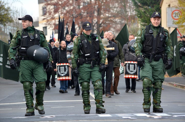 German police escort a neo-Nazi rally through the streets of Wunsiedel, Germany.