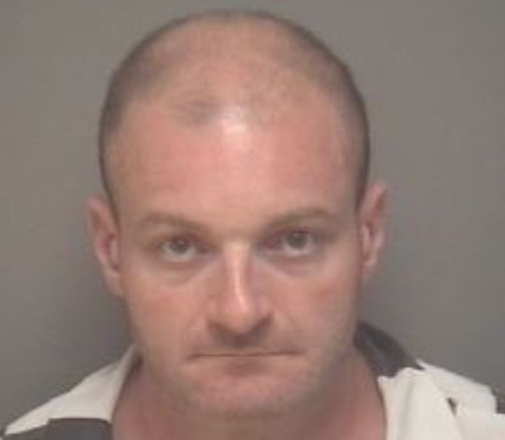 Christopher Cantwell turned himself in Wednesday