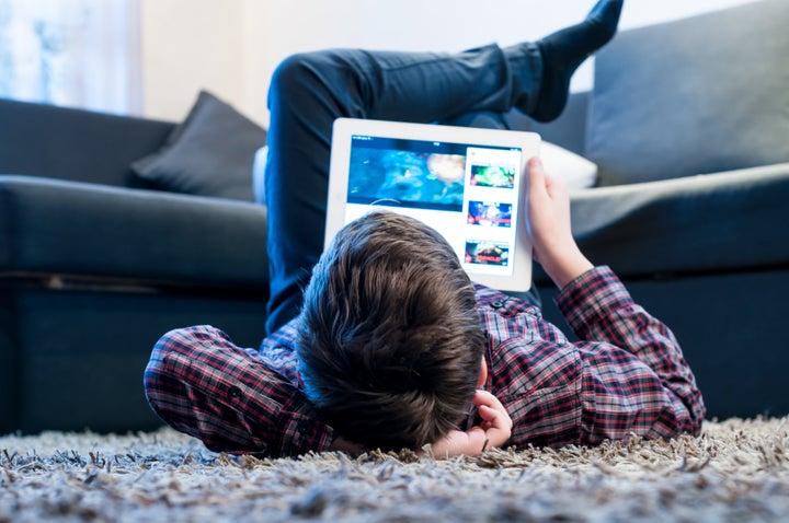 A child using a tablet.