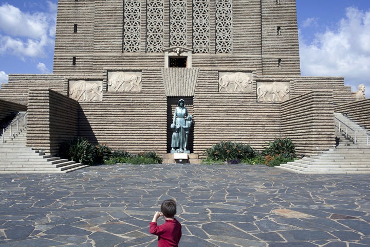 A boy stands at the Voortrekker Monument. Pretoria, South Africa. April 29.