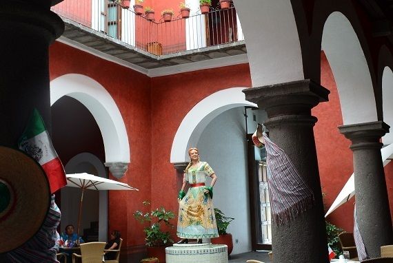 Statue of Mirra in the courtyard of a boutique hotel in Puebla.