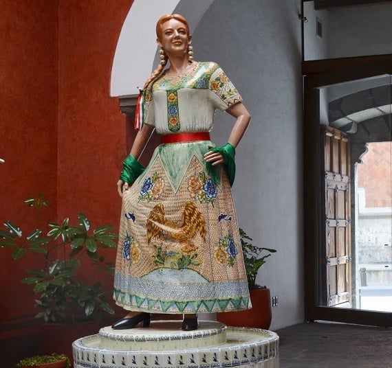 A Chinese woman visiting Santa Fe, New Mexico, wears a Louis