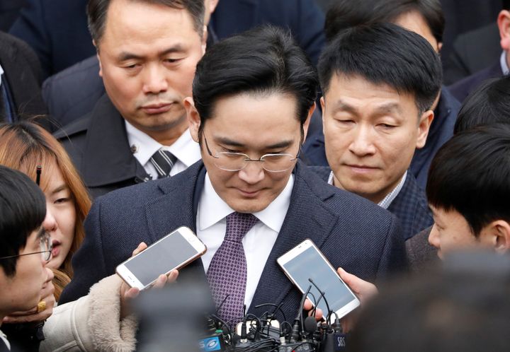 Samsung Group chief, Jay Y. Lee, was sentenced to five years behind bars on Friday for his participation in a corruption scandal.