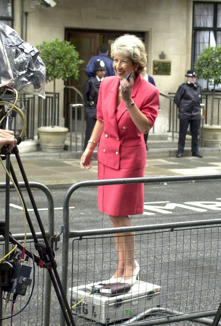 Bond reporting as royal correspondent outside the King Edward VII Hospital in 1995 where the Queen Mother had a hip operation 