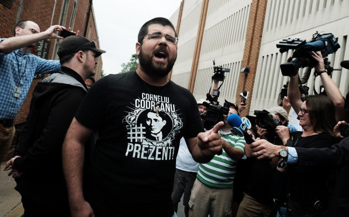 White nationalist leader Matthew Heimbach yells at the media outside the Charlottesville General Courthouse on Aug. 14, photo by Justin Ide/Reuters