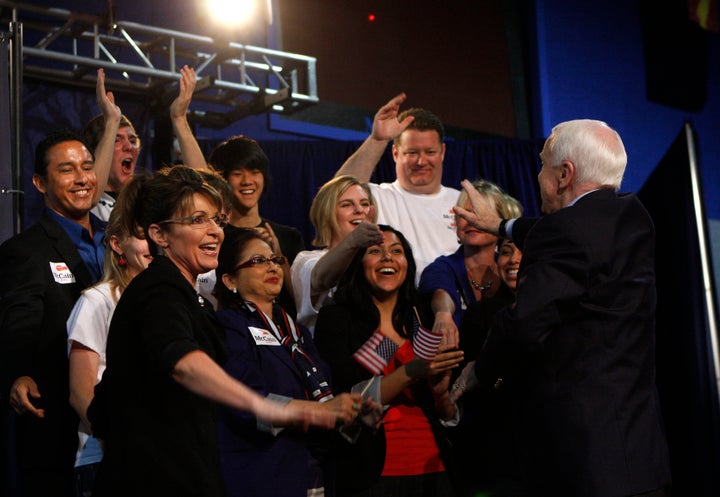 Vice presidential candidate Sarah Palin, with Sen. John McCain at a presidential campaign rally in Arizona in 2010, regularly attacked Barack Obama as somehow un-American.