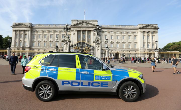 A police vehicle patrols outside Buckingham Palace on Saturday