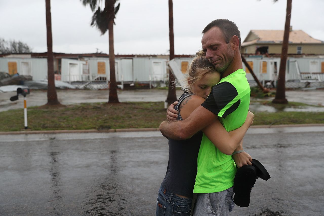 Jessica Campbell hugs Jonathan Fitzgerald after riding out Hurricane Harvey in an apartment in Rockport.
