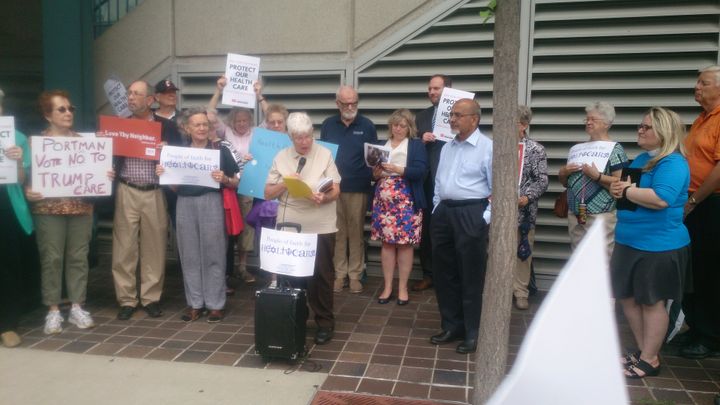 AMHP advocate, Dr. Abdul Qayyum Ahmed, participates in a vigil outside Senator Rob Portman’s office with other Cincinnati faith leaders to express their opposition to the Senate health care bill.