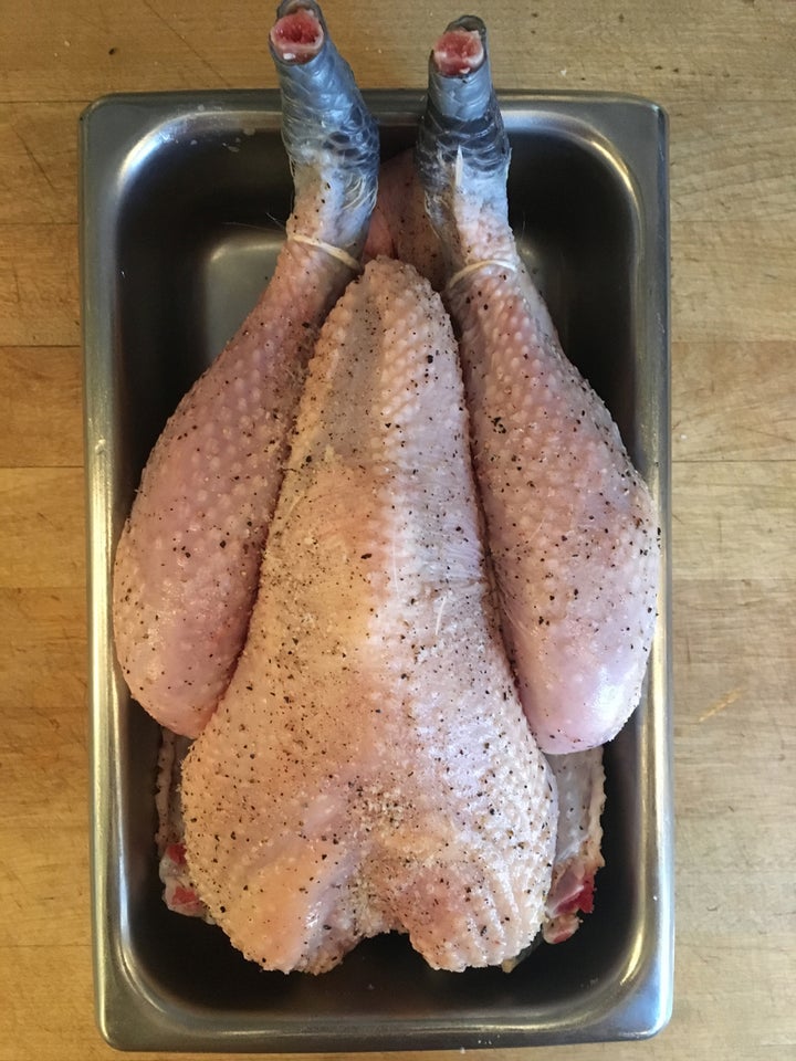 Trussed, seasoned and ready to be cooked