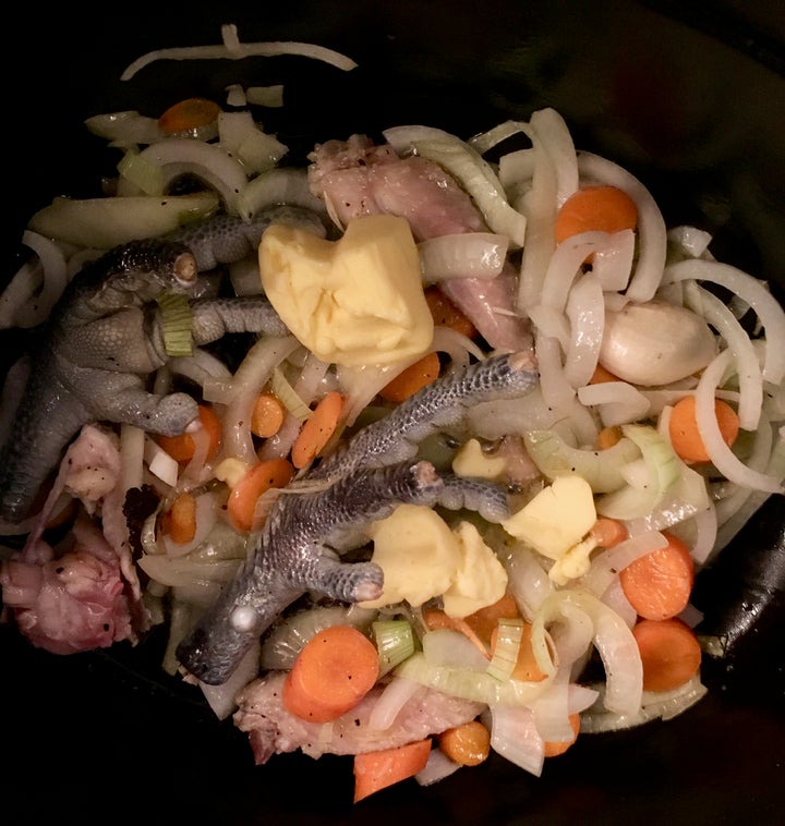 In the same pan: aromatics, chicken trimmings (including those beautiful feet) and butter