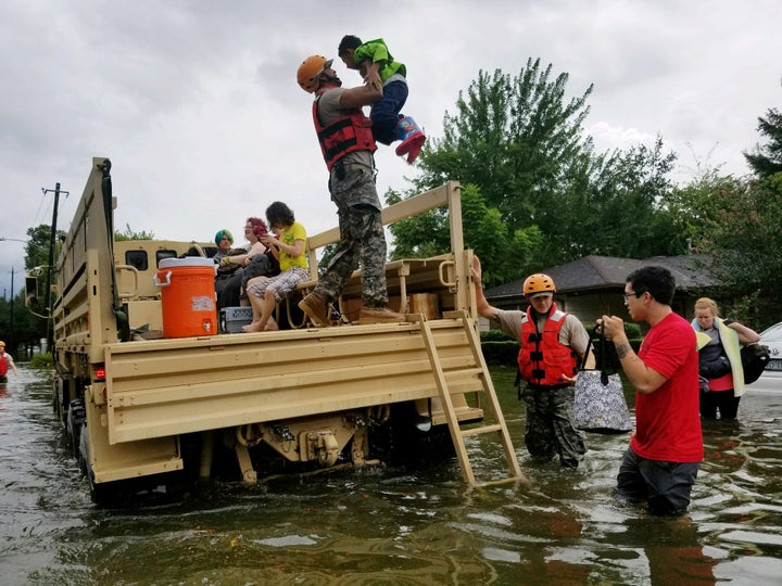 Texas National Guard soldiers aid residents in heavily flooded areas in Houston.