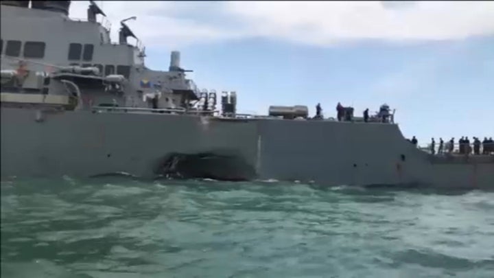 Damage is seen on the U.S. Navy guided-missile destroyer USS John S. McCain after a collision, in Singapore waters.