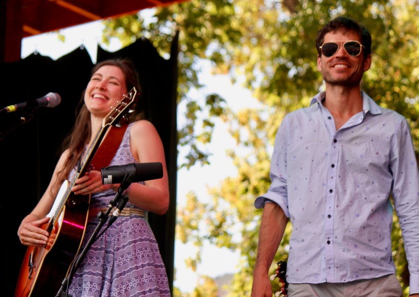 The Wailin’ Jennys’ Ruth Moody (left) and her brother Richard Moody have a laugh on Aug. 20 at the Folks Festival.