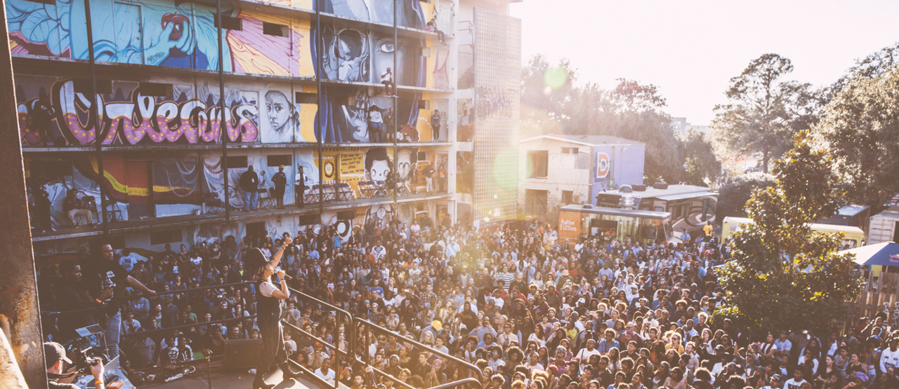 People attending a block party at Odums' "Exhibit Be" space in 2015.