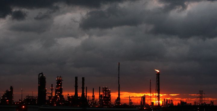 Dark clouds gather over a refinery near Houston as Hurricane Ike approaches on Sept. 12, 2008.
