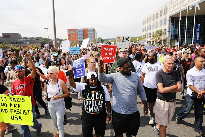 Thousands of protesters march in Boston against a planned "Free Speech Rally" just one week after the violent rally in Virginia left one woman dead and dozens more injured.