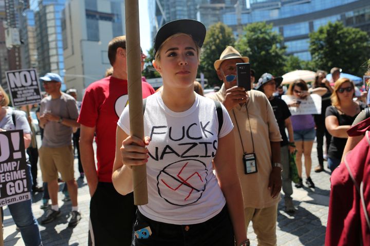 A protester wears a T-shirt with an anti-Nazi slogan at a protest against white supremacism in New York City on Aug. 13, the day after a rally organized by white supremacists in Charlottesville, Virginia, turned violent.