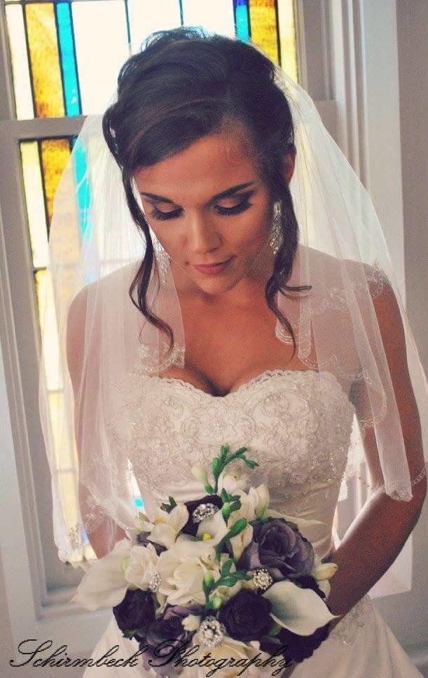Dawnetta Heinz wore this David's Bridal gown when she married Jared Heinz on July 30, 2016. 