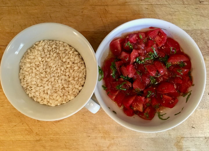 <p>Two thirds cup of rice and a double handful of cherry tomatoes are the principal ingredients</p>