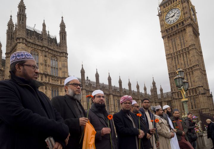 A survey has found that 52% of Brits believe Islam 'poses a threat to the West' and as a result of recent terror attacks, 42%, are 'more suspicious' of Muslims - Muslim leaders gather on Westminster Bridge in the days after the March terror attack