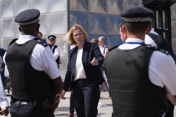 60 percent of officers (Metropolitan Police officers pictured with Home Secretary Amber Rudd) say their morale is low in the Police Federation's latest survey