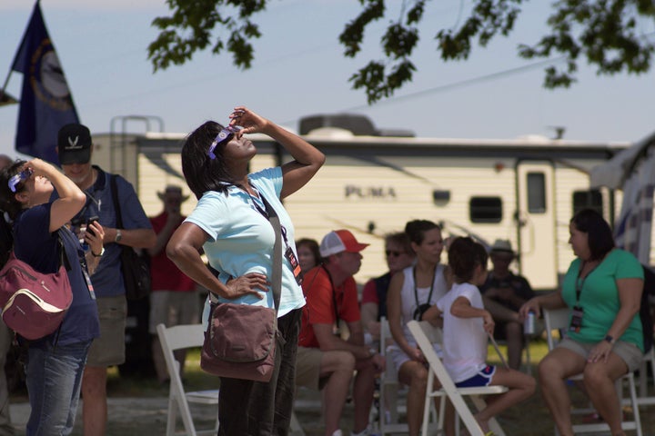 <em>Eclipse watchers in Hopkinsville, Kentucky, gaze skyward during the Great American Eclipse. NASA declared Hopkinsville to