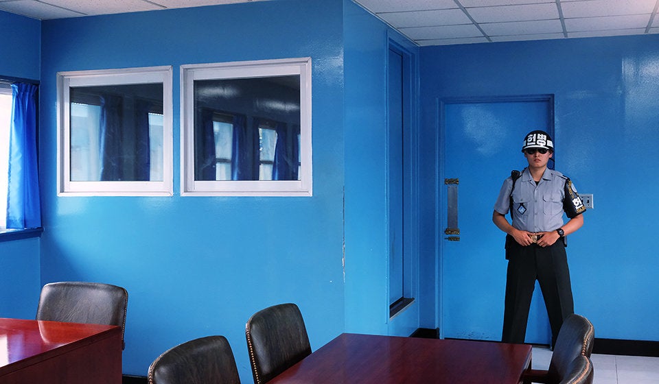 A guard stands near the Demilitarized Zone between South and North Korea.