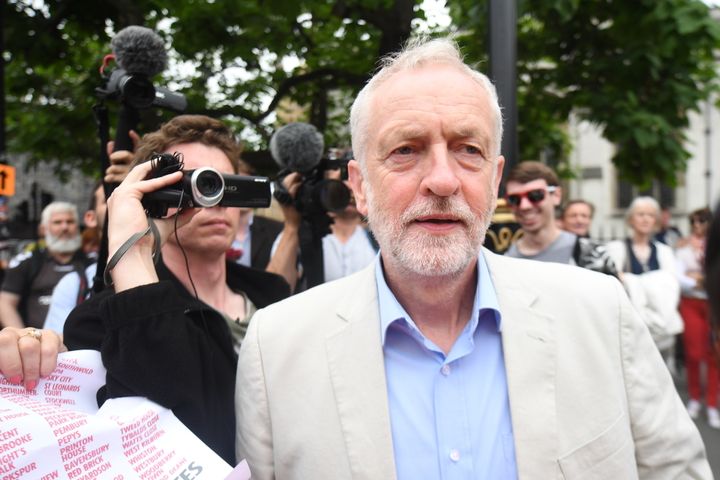 Labour leader Jeremy Corbyn arrives address an anti-austerity rally in Parliament 
