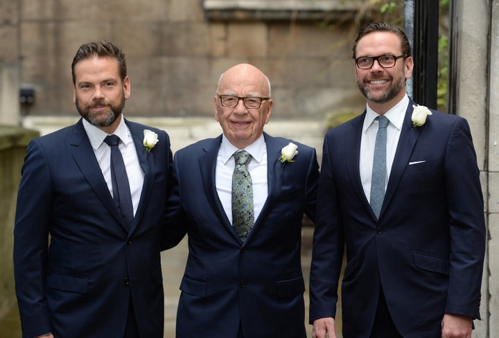 Rupert Murdoch accompanied by his sons James (right) and Lachlan (left) 