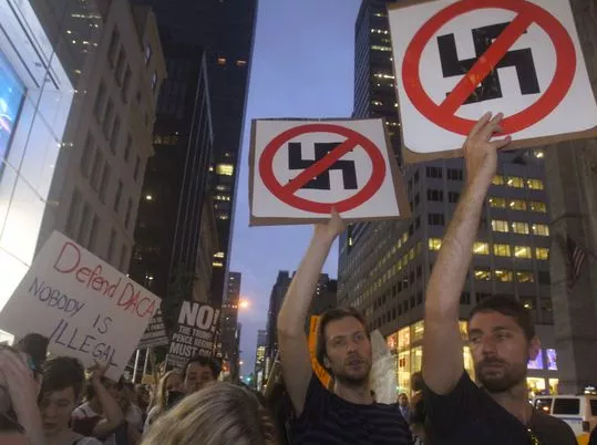 <p>Anti-Trump protesters marched near Trump Tower in New York on Aug. 15, 2017. </p>