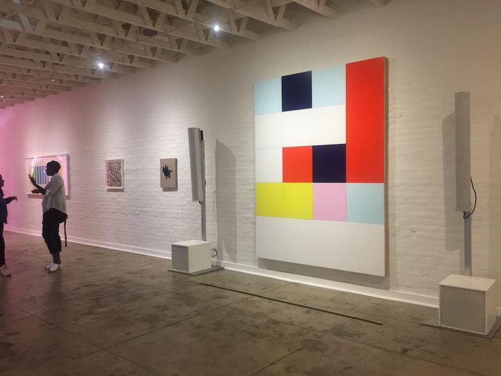 Installation shot: “Artists of Color” at The Underground Museum. Photo by Edward Goldman.