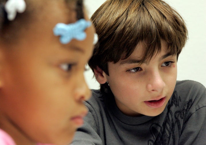 Michael Guggenheim, 12 (right) conquered his struggle with dysgraphia, a learning disorder associated with dyslexia that makes it difficult for one to write by hand.