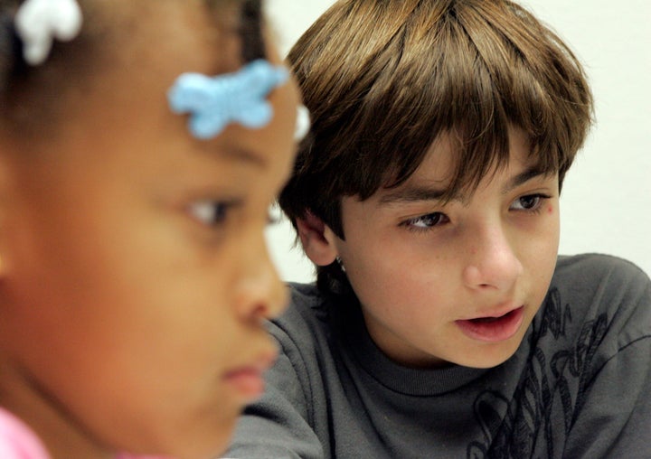 Michael Guggenheim, 12 (right) conquered his struggle with dysgraphia, a learning disorder associated with dyslexia that makes it difficult for one to write by hand. 