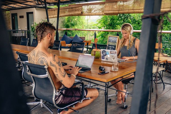 The DNX founders Marcus Meurer and Felicia Hargarten working from a coworking space on Bali, Indonesia